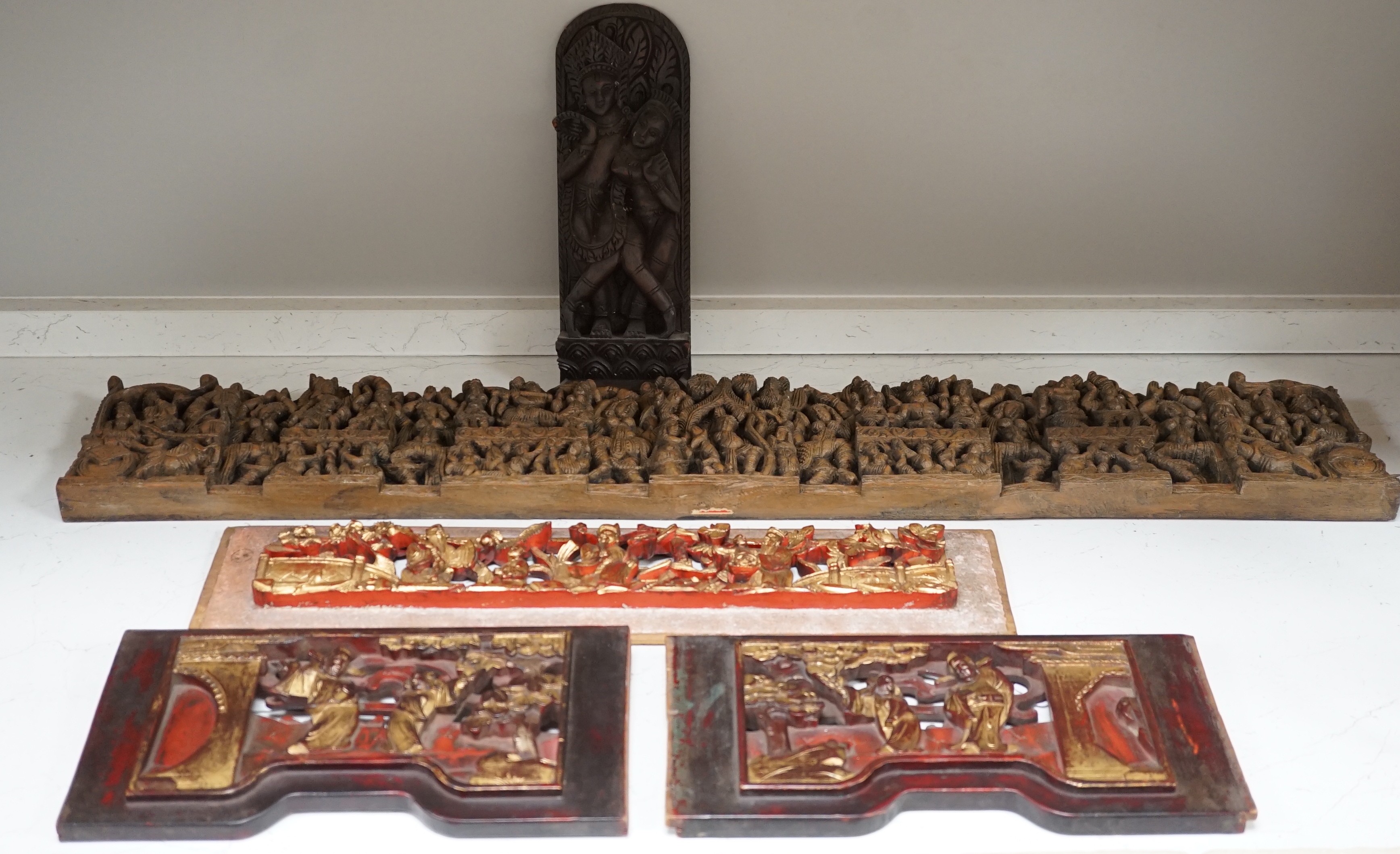 Two South East Asian carved hardwood panels together with three Chinese gilt wood panels (5) largest 6x91cm